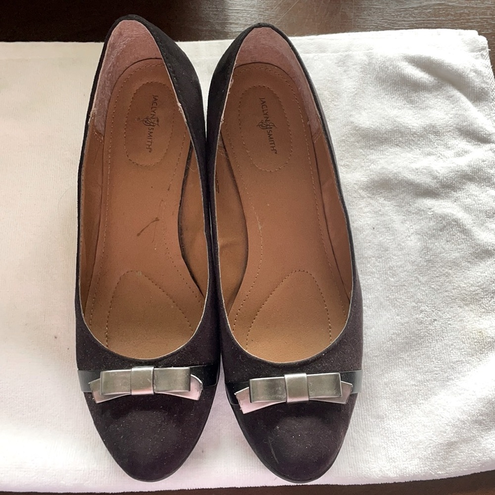 Jaclyn Smith, black suede shoe w silver bow. Low heel and very comfortable.